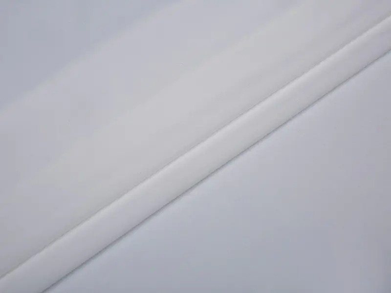 Tessuti per rivestimento dell'abbigliamento: come scegliere tessuti di fodera che sono sia assorbiti dall'umidità che adatti alla pelle?