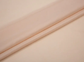 Il tessuto per rivestimento per viscosi in poliestere può mantenere la stabilità dell'abbigliamento in ambienti caldi e umidi?